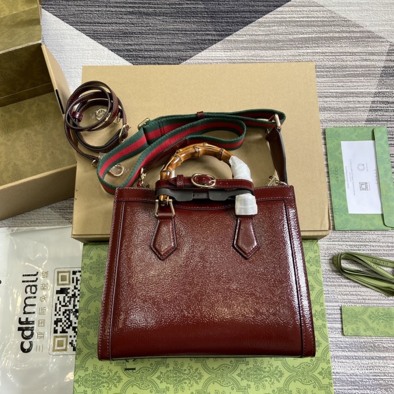 G*u*i top handle bags